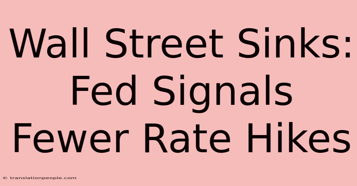 Wall Street Sinks: Fed Signals Fewer Rate Hikes